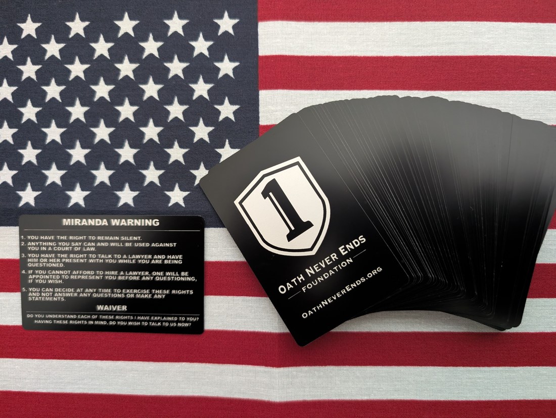 Oath Never Ends branded Miranda Warning cards (front and back)
